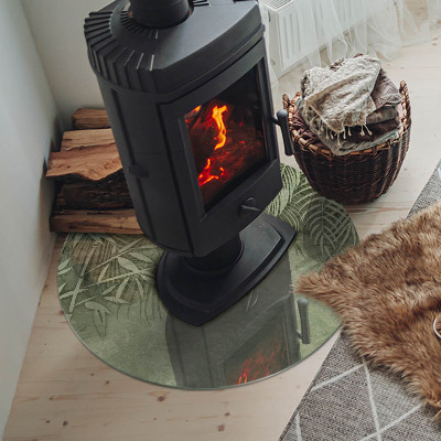 Onderplaat kachel ronde Tropische bladeren op de achtergrond