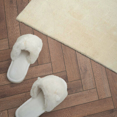 Zelfklevend wandpaneel Planken gerangschikt in een visgraatmotief