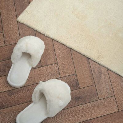 Zelfklevend wandpaneel Planken gerangschikt in een visgraatmotief