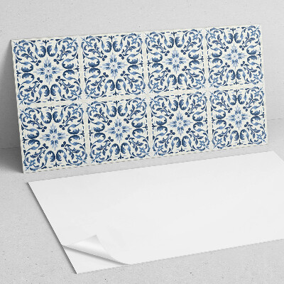 Zelfklevend wandpaneel Een bloemmotief in een tegelcompositie