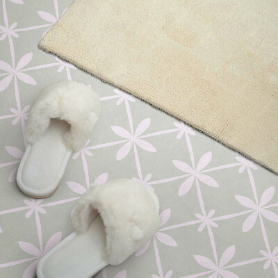 Vinyl wandpaneel Bloemenmotief in een gaas