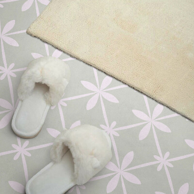 Vinyl wandpaneel Bloemenmotief in een gaas