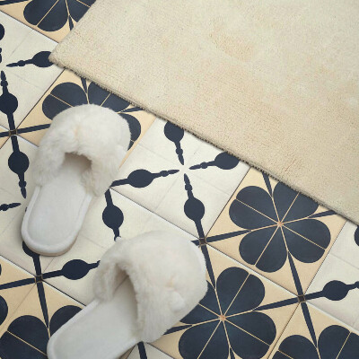 Vinyl wandpaneel Bloemenmotief op een effen achtergrond