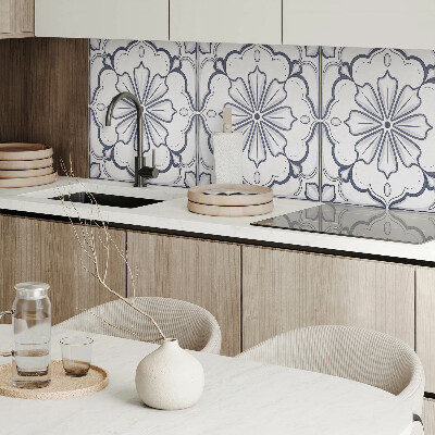 Vinyl wandpaneel Bloemenmotief op de tegel