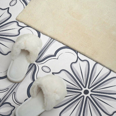 Vinyl wandpaneel Bloemenmotief op de tegel