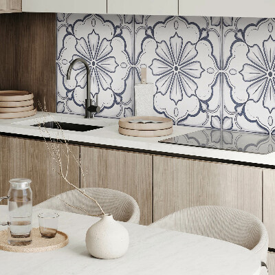 Vinyl wandpaneel Bloemenmotief op de tegel