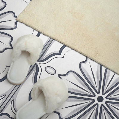 Vinyl wandpaneel Bloemenmotief op de tegel