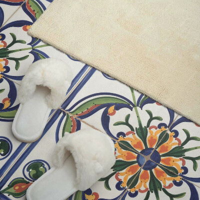 Zelfklevend wandpaneel Bloemenmotief op de tegel