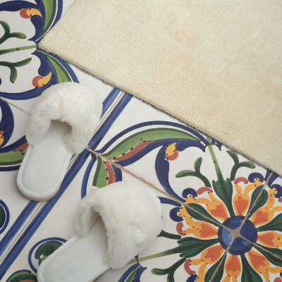 Zelfklevend wandpaneel Bloemenmotief op de tegel