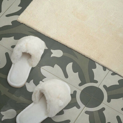 Vinyl wandpaneel Plantenmotief op de tegels