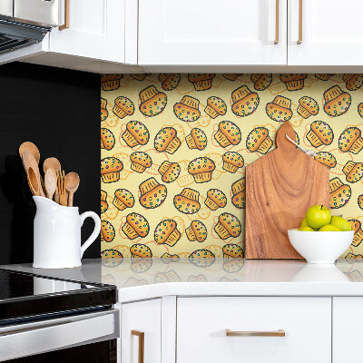 Zelfklevend muurpaneel Kleurrijke cupcakes op een gele achtergrond