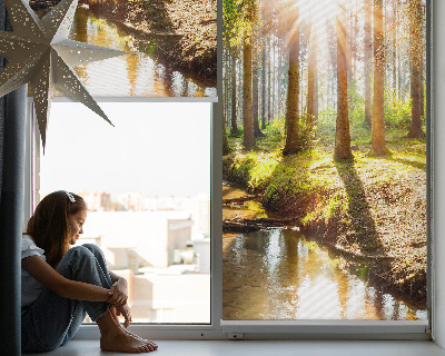 Rolgordijn verduisterend De zon schijnt door de bomen