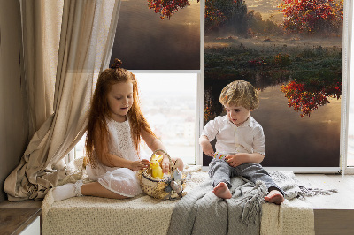 Rolgordijn voor het raam Zonsondergang achter de bomen