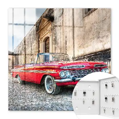 Retro auto voor een achtergrond van architectuur