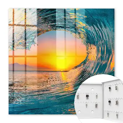Wanddecoratie van een golf bij zonsondergang