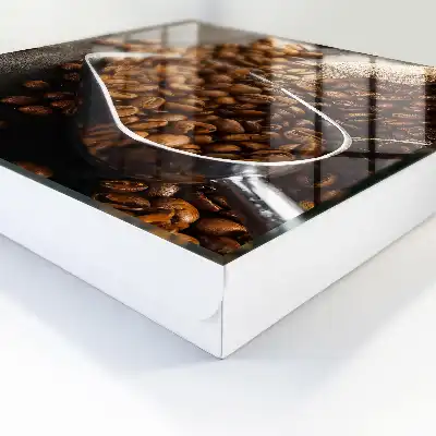Koffiebonen in een metalen lepel