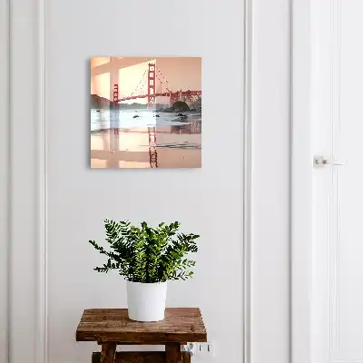 Wanddecoratie van een zonsondergang met water op de achtergrond