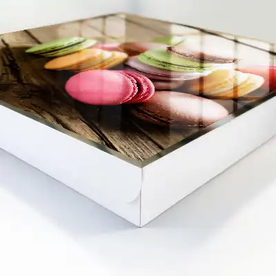 Kleurrijke snoepjes op een houten achtergrond