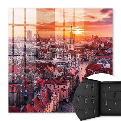 Zonsondergang boven historische daken