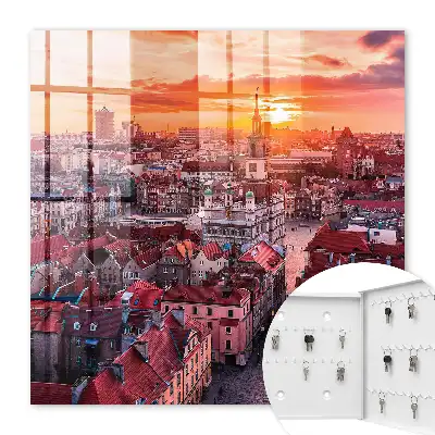 Zonsondergang boven historische daken