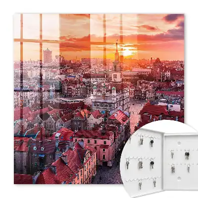Zonsondergang boven historische daken