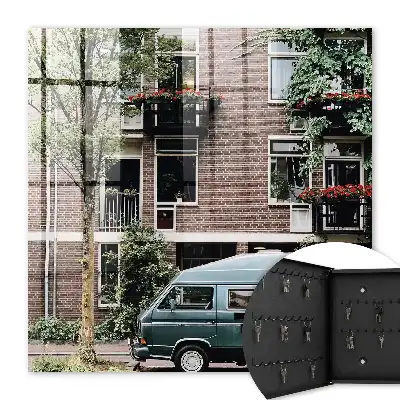 Stadsgezicht met blauwe bestelwagen