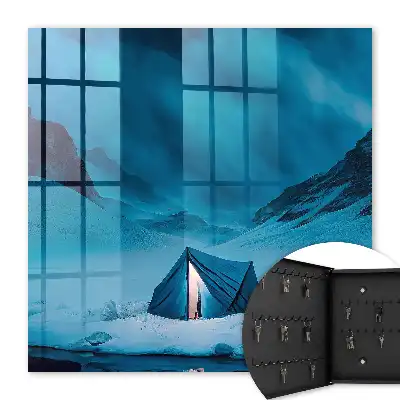 Blauwe nacht met verlichte tent