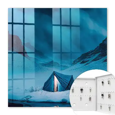 Blauwe nacht met verlichte tent