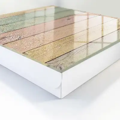 Pastelkleurige kartonnen platen met zichtbare houtnerf