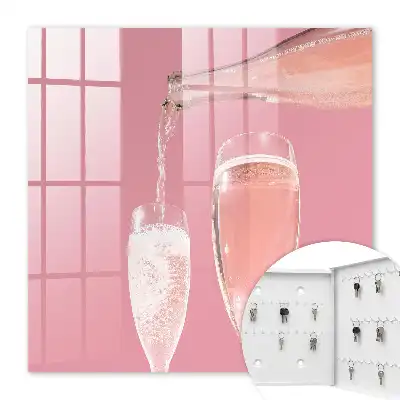 Champagneglazen met roze achtergrond