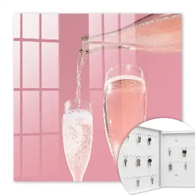 Champagneglazen met roze achtergrond