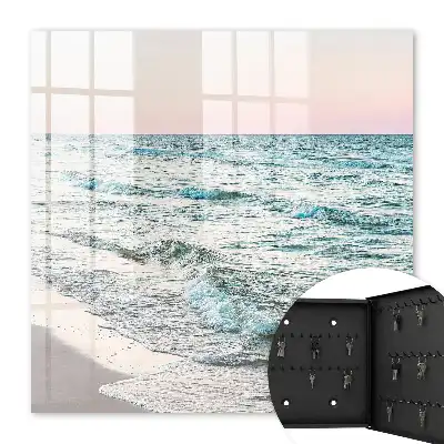 Zeegolven bij zonsondergang
