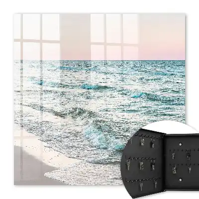 Zeegolven bij zonsondergang