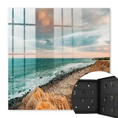 Oceaanklif bij zonsondergang