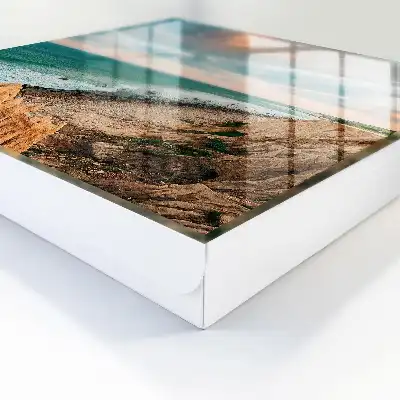 Oceaanklif bij zonsondergang