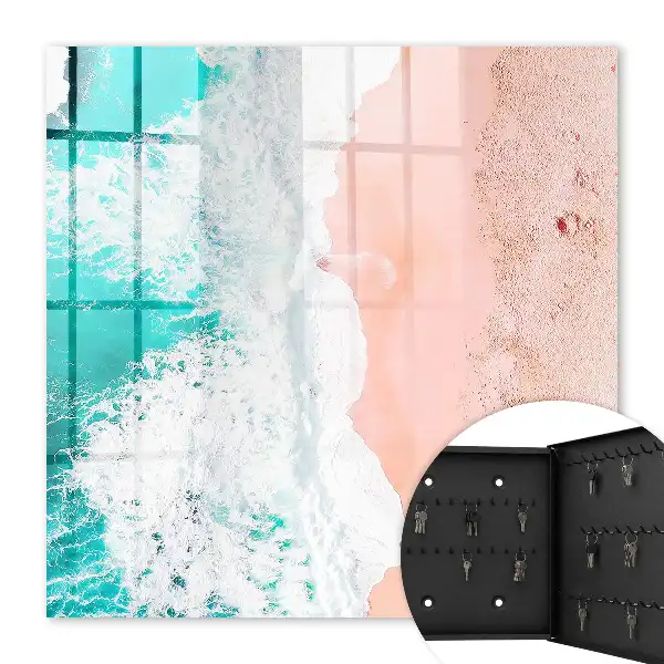 Oceaan en roze zandstrand