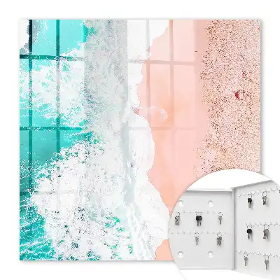 Oceaan en roze zandstrand