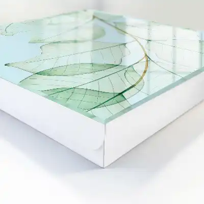 Wanddecoratie met groene bladeren op een pastelkleurige achtergrond