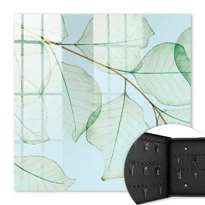 Wanddecoratie met groene bladeren op een pastelkleurige achtergrond