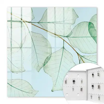 Wanddecoratie met groene bladeren op een pastelkleurige achtergrond