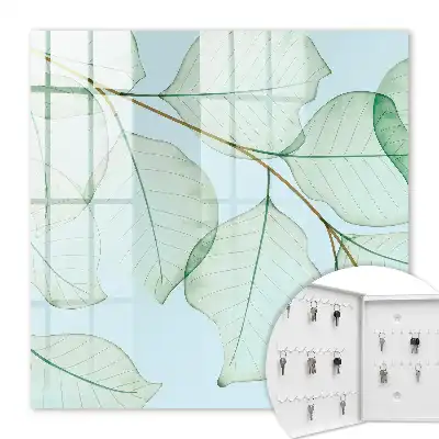 Wanddecoratie met groene bladeren op een pastelkleurige achtergrond