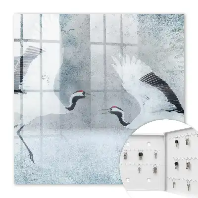 Kraanvogels in vlucht in de mist