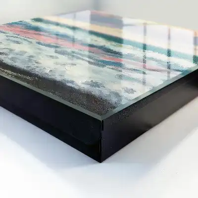Zeegezicht met pastelkleurige lucht
