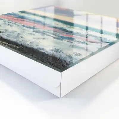Zeegezicht met pastelkleurige lucht