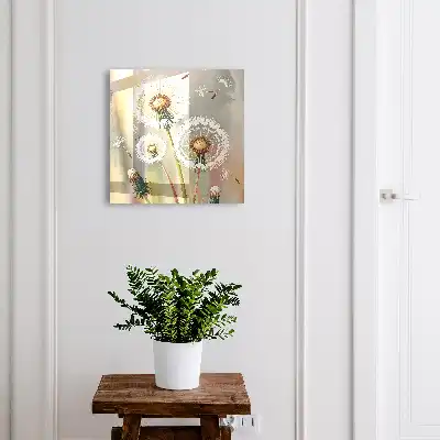 Fijne paardenbloemen op een beige achtergrond