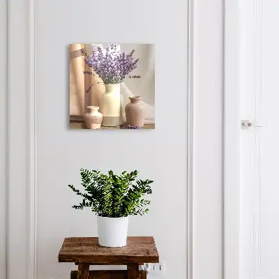 Bloemen in een crèmekleurige vaas