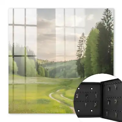 Een idyllisch landschap met velden en bossen