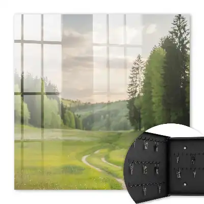 Een idyllisch landschap met velden en bossen