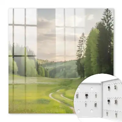 Een idyllisch landschap met velden en bossen