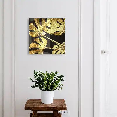 Monstera-bladeren op een zwarte achtergrond